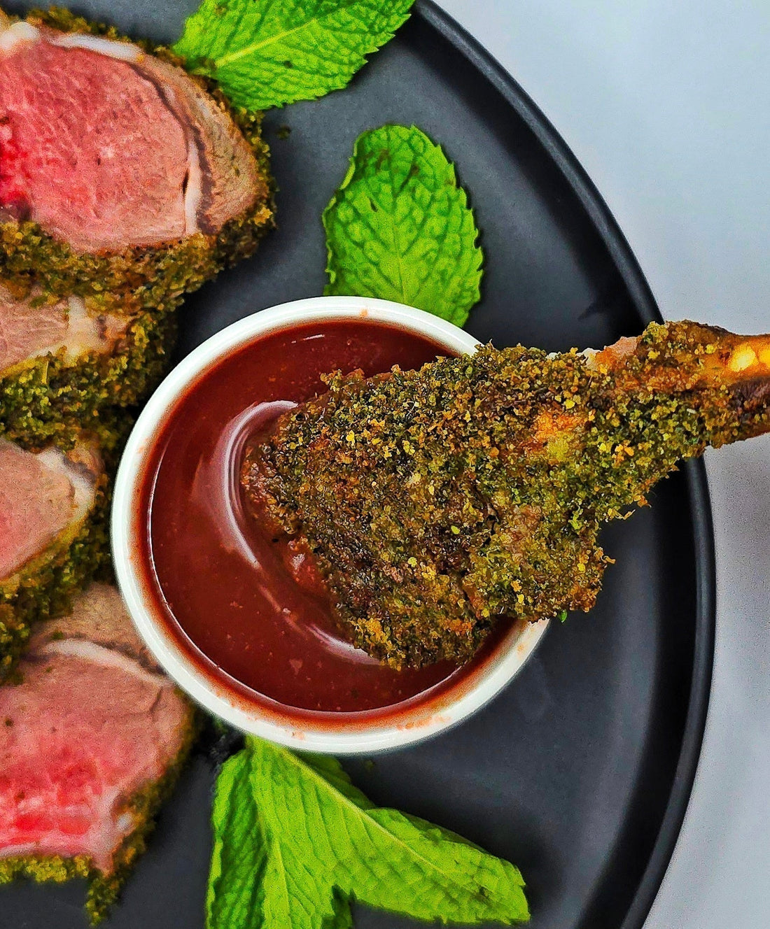 Herb-Crusted Rack of Lamb with Midnight Mojito Sauce
